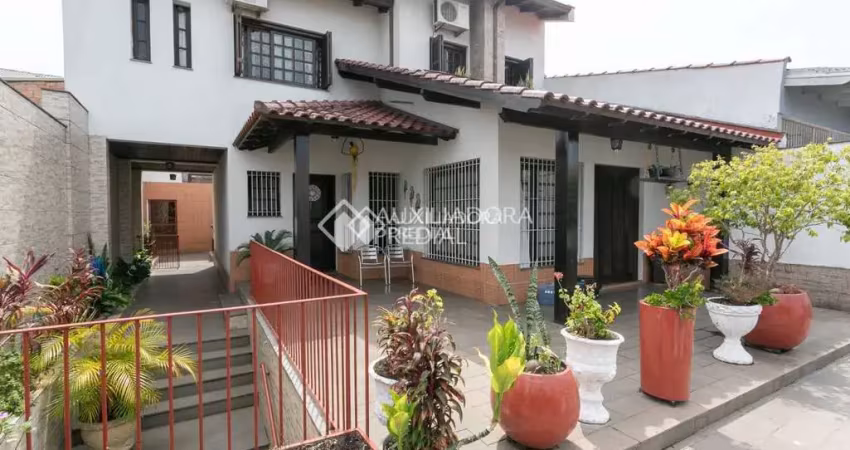 Casa em condomínio fechado com 3 quartos à venda na Rua Arnaldo Ballve, 709, Jardim Itu Sabará, Porto Alegre