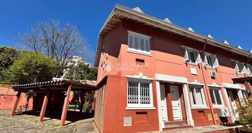 Casa em condomínio fechado com 3 quartos à venda na Avenida Arnaldo Bohrer, 184, Teresópolis, Porto Alegre