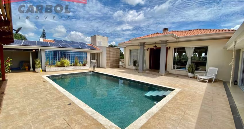 PARQUE DA FAZENDA - AT 1.230m² - AC 700m² - 4 SUÍTES - 6 VAGAS - PISCINA