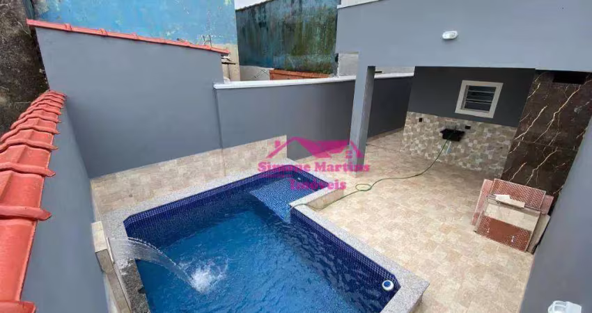 Casa nova com piscina com acabamento impecável na praia de mongaguá