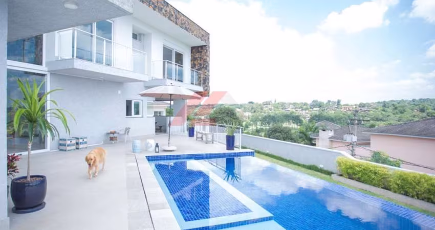 Luxuosa casa em condomínio à venda em Cotia-SP, bairro São Paulo II, com 4 quartos, 3 suítes, 1 sala, 5 banheiros e 632m².