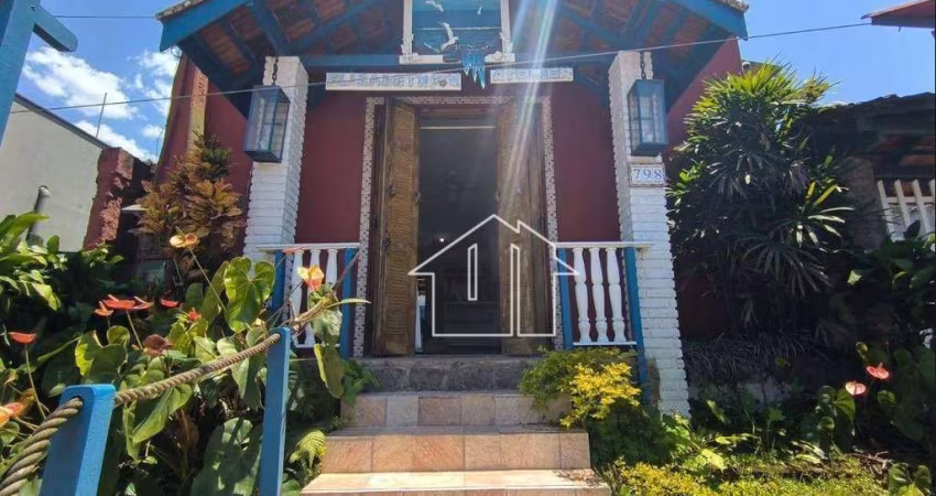 Casa com 4 dormitórios à venda, 215 m² por R$ 1.500.000,00 - Enseada - Ubatuba/SP