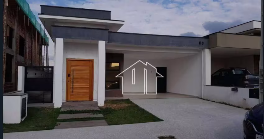 Casa com 3 dormitórios à venda, 158 m² por R$ 1.100.000,00 - Condomínio Malibu - Caçapava/SP