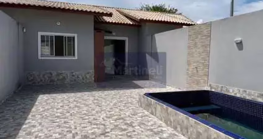 Imperdível oportunidade de adquirir uma casa de 2 quartos no jardim guacyra, itanhaém-sp, com 2 vagas de garagem!