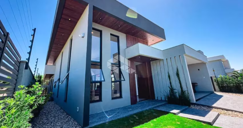 CASA COM 3 QUARTOS, SENDO 2 SUÍTES, 2 VAGAS DE GARAGEM NO BAIRRO CAMPECHE EM FLORIANÓPOLIS/SC.