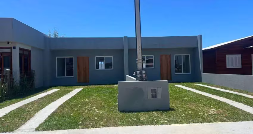Casa geminada 2 dorm à venda no Bairro Arpoador com 55 m² de área privativa - 2 vagas de garagem