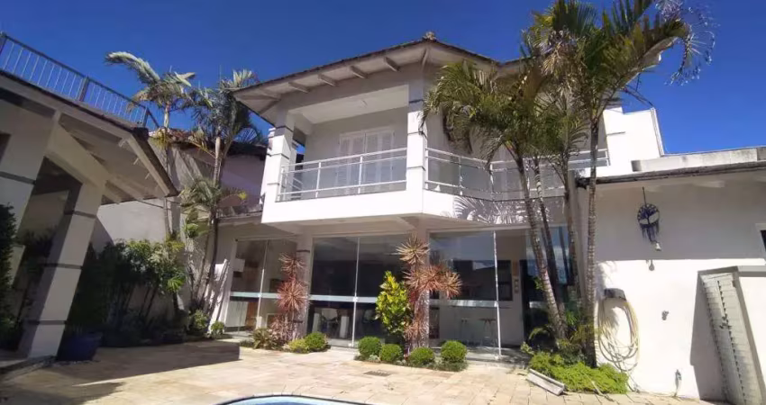Sobrado 03 Dorm à venda no Bairro CAPÃO NOVO - 2 vagas de garagem