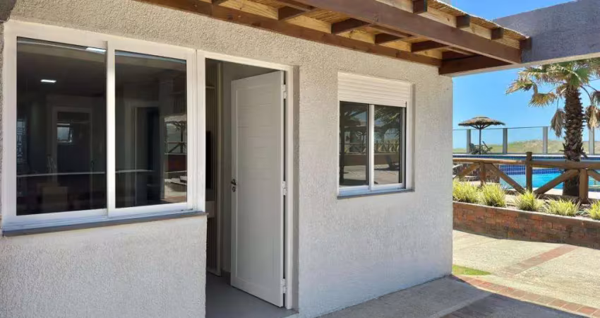 Casa 02 Dorm à venda no Bairro CAPÃO NOVO com 60 m² de área privativa - 1 vaga de garagem