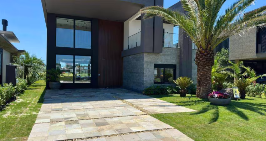 Casa 04 Dorm à venda no Bairro CAPÃO NOVO com 344 m² de área privativa - 2 vagas de garagem