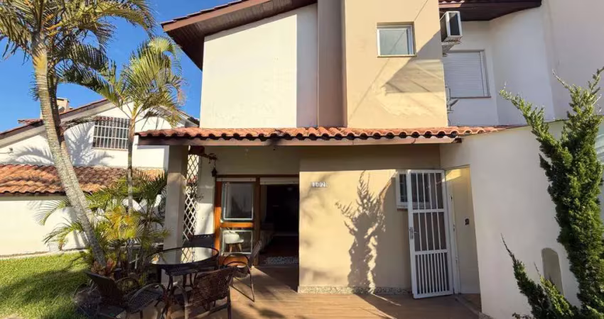 Sobrado 02 dorm à venda no bairro capão novo com 75 m² de área privativa - 2 vagas de garagem
