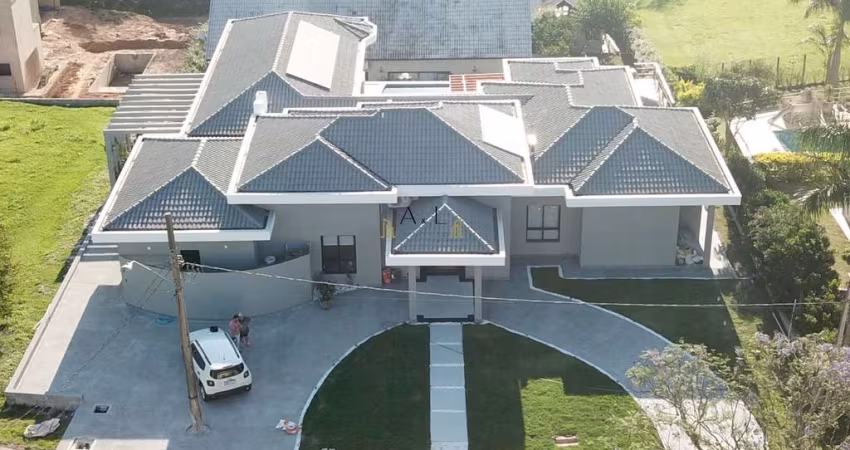 Casa com 5 dormitórios à venda, 437 m² por R$ 3.100.000 - Condomínio Vale do Lag