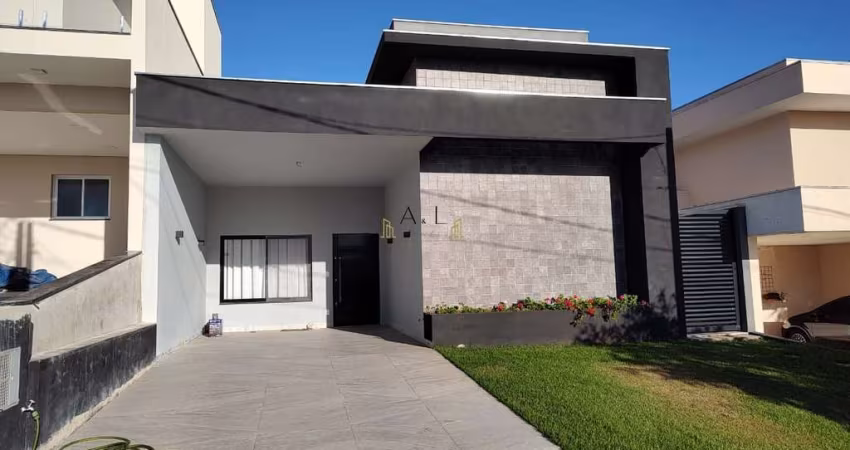 Casa com 3 dormitórios à venda, 134 m² por R$ 860.000,00 - Condomínio Campos do