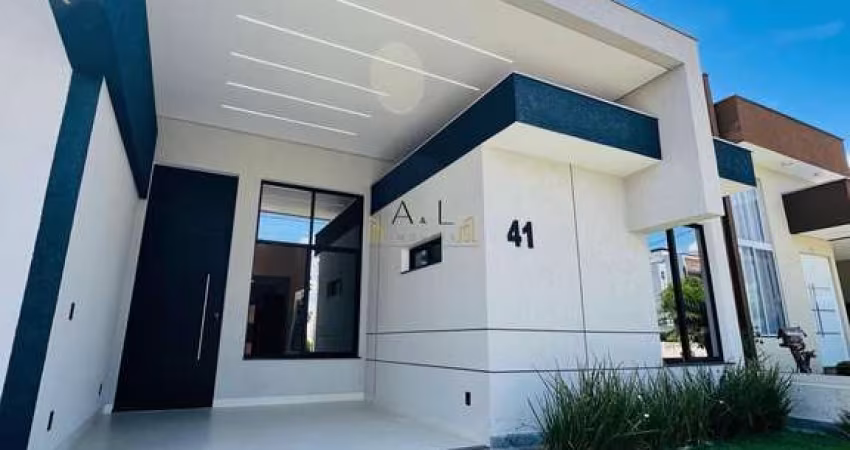 Casa com 3 dormitórios à venda, 107 m² por R$ 779.000,00 - Condomínio Terras de