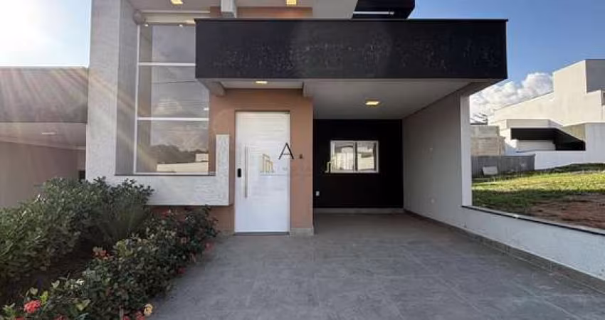 Casa com 3 dormitórios à venda, 105 m² por R$ 660.000 - Condomínio Villaggio Ipa