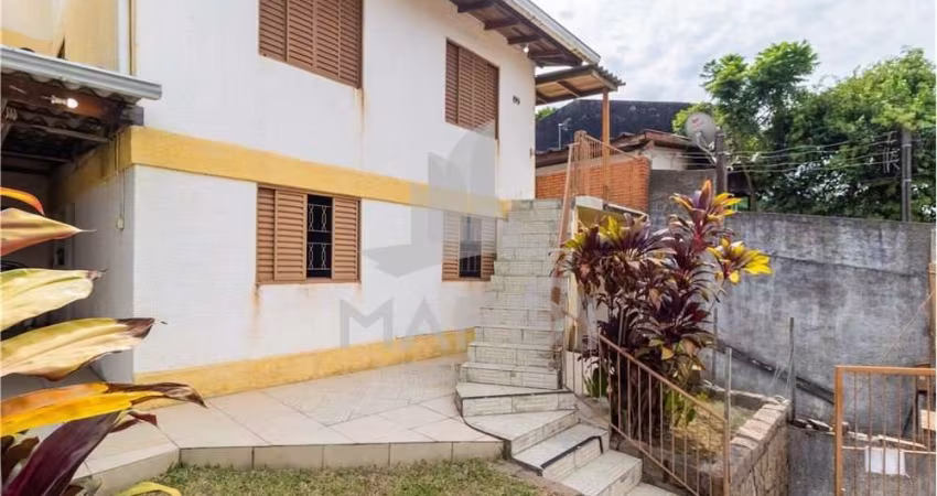 Casa com 5 quartos à venda na Rua Carlos Ribeiro da Silva, 199, Partenon, Porto Alegre