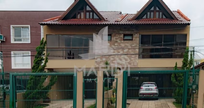 Casa com 3 quartos à venda na Rua Dom Jaime de Barros Câmara, 705, Sarandi, Porto Alegre