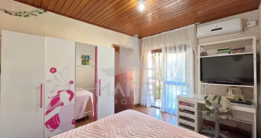 Casa com 4 quartos à venda na Rua Xavier da Cunha, 507, Cristal, Porto Alegre
