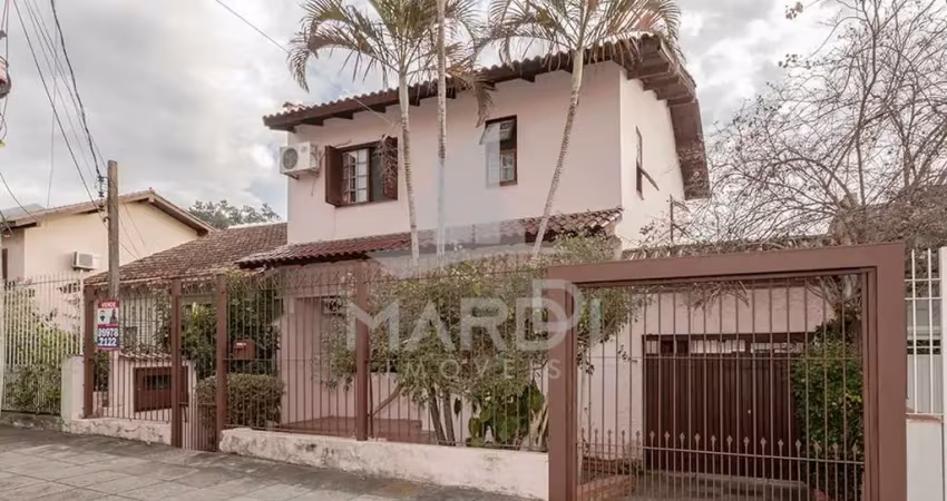 Casa com 4 quartos à venda na Três Passos, 107, Passo da Areia, Porto Alegre