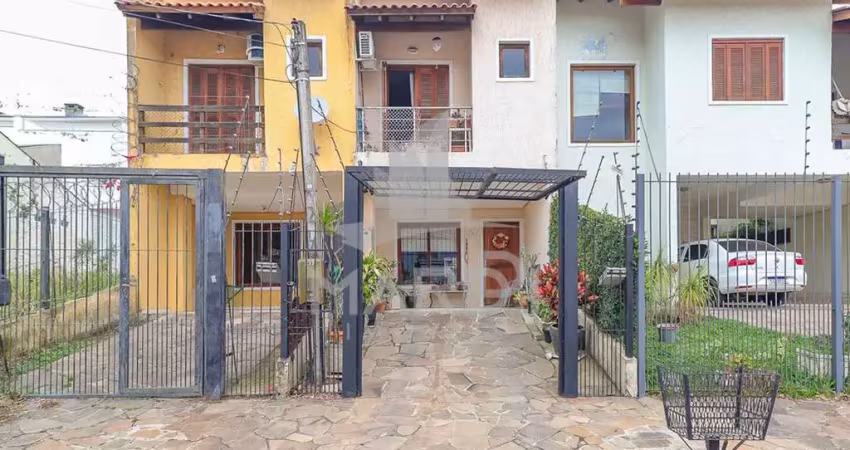 Casa com 2 quartos à venda na Rua Giobatta Giuseppe Petracco, 237, Vila Nova, Porto Alegre