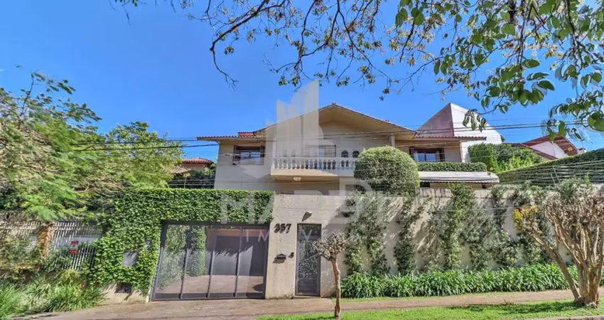 Casa com 4 quartos à venda na Rua Felipe Becker, 357, Três Figueiras, Porto Alegre