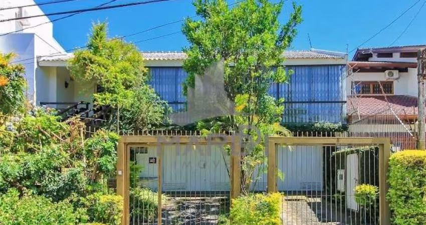 Casa com 3 quartos à venda na Rua Doutor Benjamin Camozato, 70, Jardim Isabel, Porto Alegre