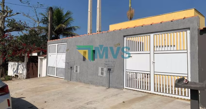 Casa à venda em Itanhaém-SP, Jardim Regina: 2 quartos, 1 suíte, 2 salas, 2 vagas, 68m². Aproveite!