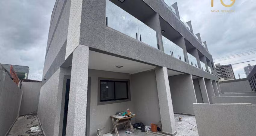 Sobrado com 3 dormitórios à venda, 121 m² por R$ 690.000,00 - Caiçara - Praia Grande/SP