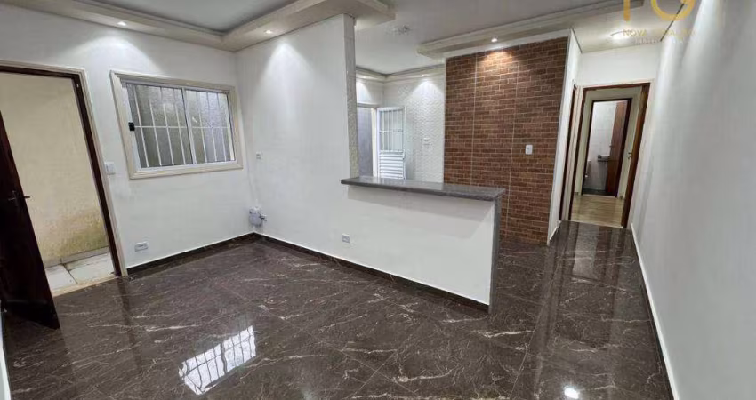 Casa com 2 dormitórios à venda, 100 m² por R$ 375.000,00 - Caiçara - Praia Grande/SP