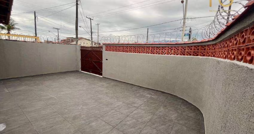 Casa com 2 dormitórios à venda por R$ 410.000,00 - Caiçara - Praia Grande/SP