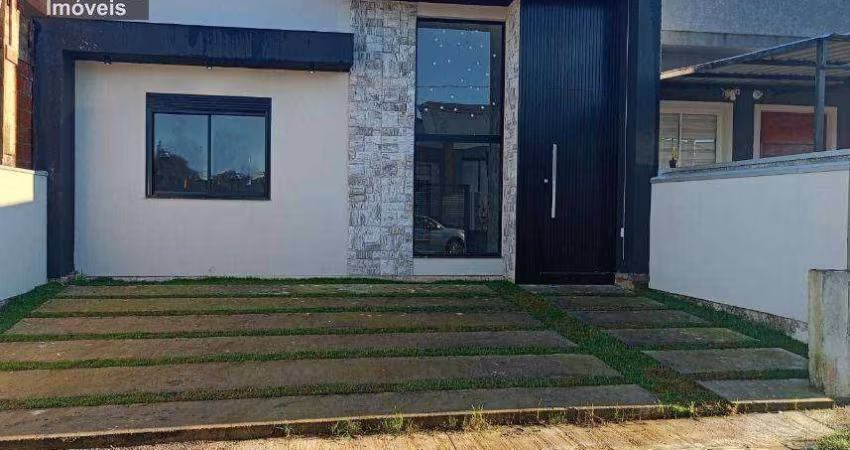 Excelente casa com 3 dormitórios à venda, 110 m² por R$ 750.000 - Garden Ville - Gravataí/RS