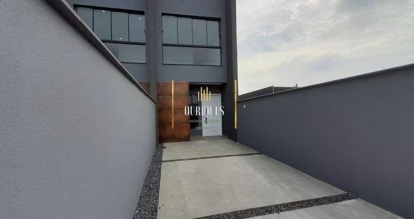 Geminado com 2 suites e 2 vagas de garagem