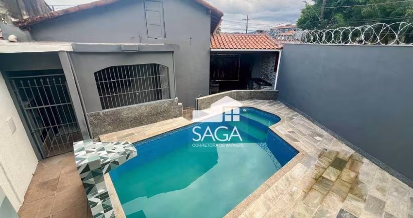Casa com 2 dormitórios à venda por R$ 570.000 - Caiçara - Praia Grande/SP