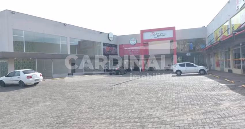 salão comercial em conjunto de lojas.