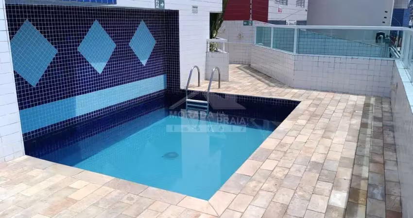 Apartamento mobiliado na ocian, 2 dormitórios, sacada, confira na imobiliária em praia grande.