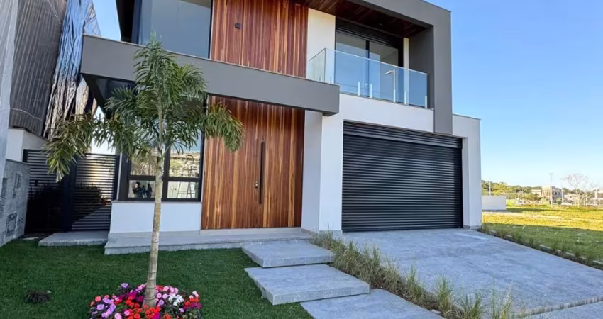 Casa Reserva da Pedra na Pedra Branca com 3 suítes, 4 banheiros e 2 vagas de garagem