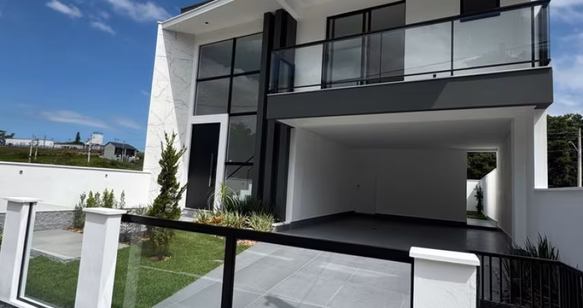 Casa em Forquilhas com 4 quartos sendo 1 suíte, 2 banheiros e 2 vagas de garagem