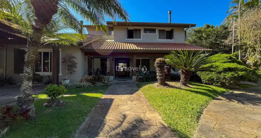 Casa em condomínio fechado com 5 quartos à venda na Avenida Coronel Marcos, 1334, Pedra Redonda, Porto Alegre