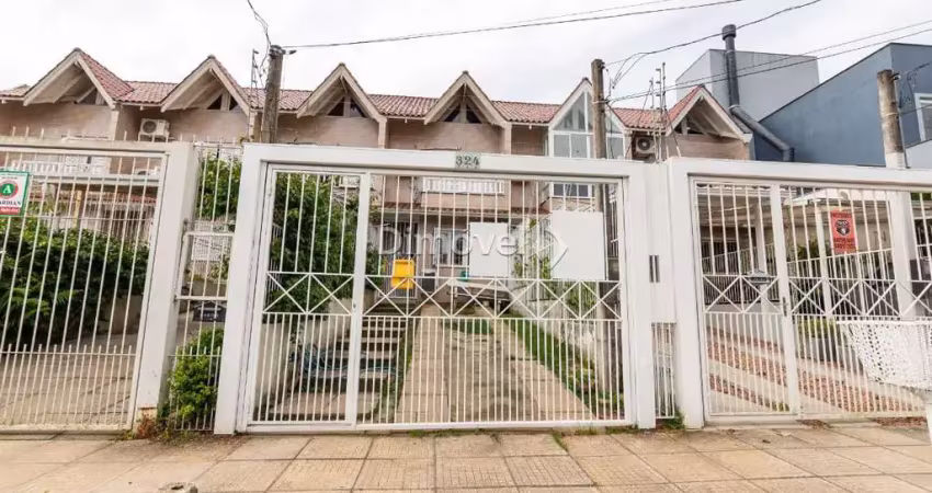 Casa com 2 quartos à venda na Rua Heitor Kramer, 324, Guarujá, Porto Alegre