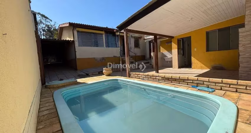 Casa com 3 quartos à venda na Rua Doutor Ney Cabral, 447, Nonoai, Porto Alegre