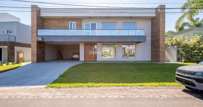 Casa em condomínio fechado com 5 quartos à venda na Avenida Juca Batista, 8000, Belém Novo, Porto Alegre