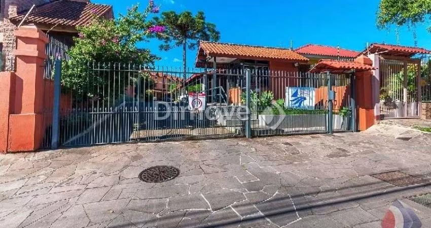 Casa em condomínio fechado com 3 quartos à venda na Rua Sílvio Silveira Soares, 2406, Camaquã, Porto Alegre