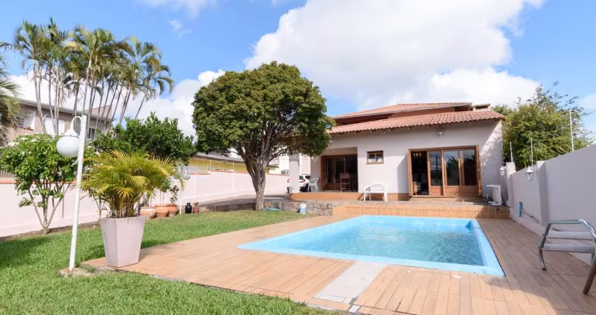Casa com 4 quartos à venda na Rua Atílio Supertti, 623, Vila Nova, Porto Alegre