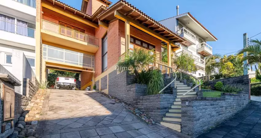 Casa em condomínio fechado com 3 quartos à venda na Rua Alcebíades Antônio dos Santos, 356, Nonoai, Porto Alegre