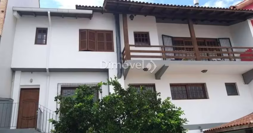 Casa com 4 quartos à venda na Rua Alcebíades Antônio dos Santos, 513, Nonoai, Porto Alegre
