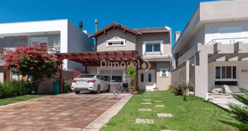 Casa em condomínio fechado com 3 quartos à venda na Avenida Juca Batista, 8000, Belém Novo, Porto Alegre
