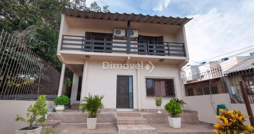Casa com 4 quartos à venda na Avenida Belém Velho, 2335, Vila Nova, Porto Alegre