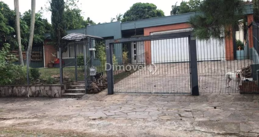 Casa com 4 quartos à venda na Rua Potiguara, 181, Vila Assunção, Porto Alegre