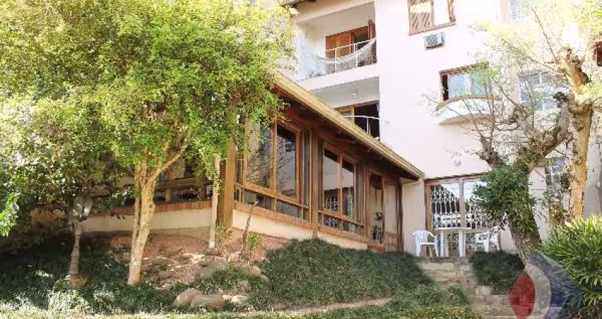 Casa com 3 quartos à venda na Rua Edgar Luiz Schneider, 55, Jardim Isabel, Porto Alegre