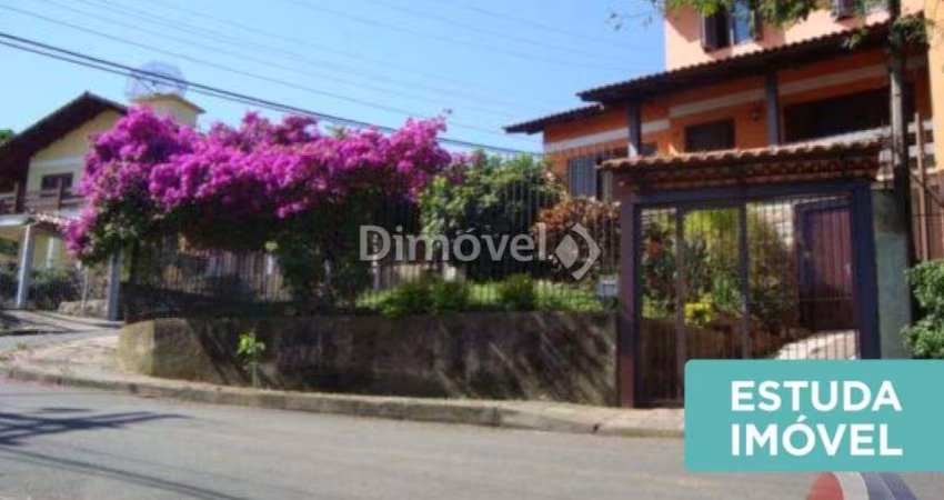 Casa com 5 quartos à venda na Rua Ângelo Passuelo, 79, Vila Nova, Porto Alegre