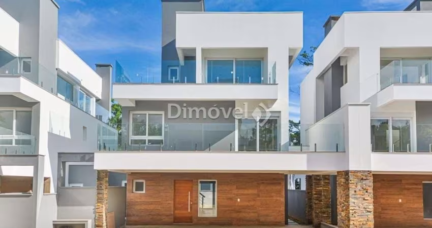 Casa em condomínio fechado com 3 quartos para alugar na Avenida Coronel Marcos, 1239, Pedra Redonda, Porto Alegre